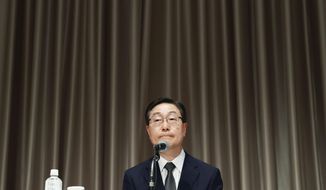 Tomihiro Tanaka, head of the Japan branch of South Korea’s Unification Church, speaks during a press conference in Tokyo, Monday, July 11, 2022. The Japan branch of South Korea’s Unification Church acknowledged Monday as its member the mother of the suspect in the assassination of former Prime Minister Shinzo Abe, but denied that it demanded large donations from anyone.(Yohei Fukai/Kyodo News via AP)