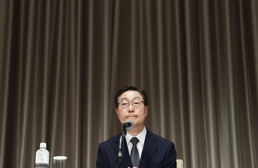 Tomihiro Tanaka, head of the Japan branch of South Korea’s Unification Church, speaks during a press conference in Tokyo, Monday, July 11, 2022. The Japan branch of South Korea’s Unification Church acknowledged Monday as its member the mother of the suspect in the assassination of former Prime Minister Shinzo Abe, but denied that it demanded large donations from anyone.(Yohei Fukai/Kyodo News via AP)
