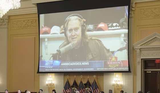 Steve Bannon is seen on a video screen as the House select committee investigating the Jan. 6, 2021, attack on the U.S. Capitol holds a hearing at the Capitol in Washington, Tuesday, July 12, 2022. (Sarah Silbiger/Pool via AP)