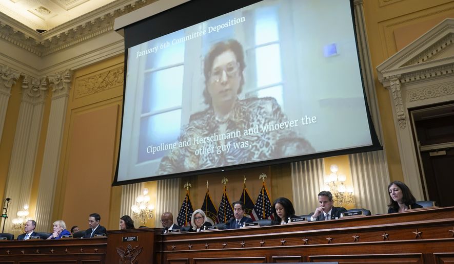 A video deposition from Sidney Powell, former Trump campaign attorney, is shown as the House select committee investigating the Jan. 6 attack on the U.S. Capitol holds a hearing at the Capitol in Washington, Tuesday, July 12, 2022. (AP Photo/J. Scott Applewhite)