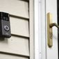 A Ring doorbell camera is seen installed outside a home in Wolcott, Conn., on July 16, 2019.  (AP Photo/Jessica Hill, File)
