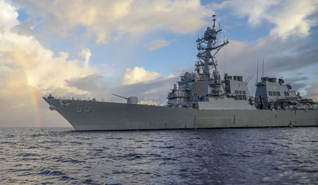 In this photo provided by U.S. Navy, Arleigh Burke-class guided-missile destroyer USS Benfold (DDG 65) conducts routine underway operations in the Philippines Sea on June 24, 2022. The U.S. Navy on Wednesday, July 13, 2022, sailed the destroyer close to China-controlled islands in the South China Sea in what Washington said was a patrol aimed at asserting freedom of navigation through the strategic seaway. (Mass Communication Specialist 2nd Class Arthur Rosen/U.S. Navy via AP)