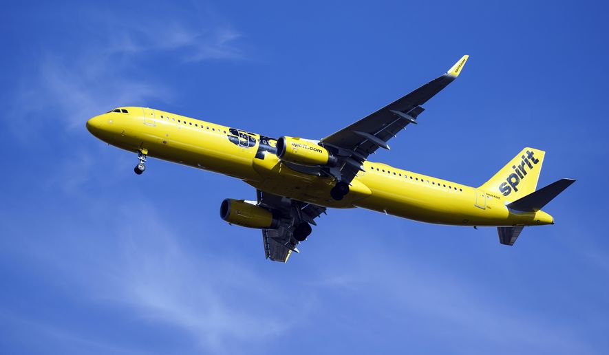 A Spirit Airlines jet approaches Philadelphia International Airport in Philadelphia, Pa., on Wednesday, Feb. 24, 2021. Spirit announced on Thursday, July 7, 2022, that it would again postpone a vote on the proposed merger with Frontier, a sign that it lacks shareholder support for the merger in the face of a rival bid by JetBlue Airways. Spirit delayed the vote by a week, until July 15. (AP Photo/Matt Rourke, File)