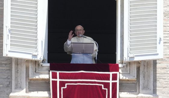 Pope Francis delivers the Angelus noon prayer from his studio window overlooking St. Peter&#x27;s Square at the Vatican, Sunday, July, 10, 2022. (AP Photo/Gregorio Borgia)