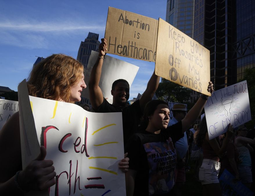 Protesters rally at the Ohio Statehouse in support of abortion rights after the Supreme Court overturned Roe vs. Wade on, June 24, 2022 in Columbus, Ohio. The story about an alleged rape of a 10-year-old Ohio girl who had to travel to Indiana for an abortion touched on a white-hot issue due to the U.S. Supreme Court's ruling on abortion. (Barbara J. Perenic/The Columbus Dispatch via AP, File)