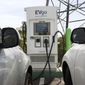 Electric cars are parked at a charging station in Sacramento, Calif., on April 13, 2022. General Motors, Pilot Travel Centers and EVgo said Thursday, July 14, 2022, that they will build 2,000 charging stalls at “up to” 500 Pilot Flying J sites across the nation. GM says construction will start this summer with the first direct current fast chargers operating sometime in 2023. (AP Photo/Rich Pedroncelli, File)