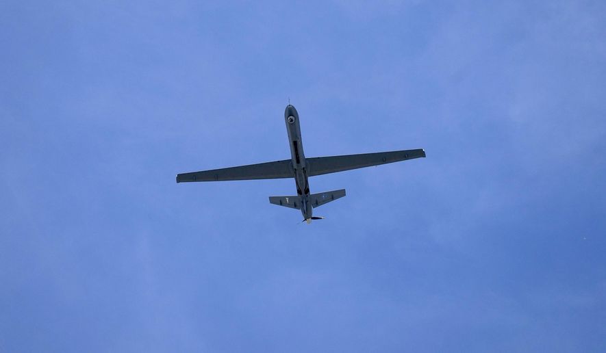 A drone takes part in the Bastille Day parade on Thursday, July 14, 2022, in Paris. (AP Photo/Michel Euler) ** FILE **