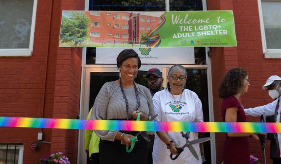 D.C. Mayor Muriel Bowser (left) participates in a ribbon-cutting ceremony in Southeast on July 14 for a homeless shelter for LGBT adults, which administration officials say is the city&#x27;s first such facility. (Courtesy of the mayor&#x27;s office)