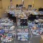 In this photo released by the San Francisco Police Department are some of the more than $200,000 in stolen retail goods seized from a home this week in San Francisco. Police arrested a man they say has made $500,000 annually selling stolen over-the-counter medication and personal care products online. Investigators found the stolen items Wednesday, July 13, 2022, during a search of a home in the Ingleside neighborhood following a monthslong investigation. (San Francisco Police Department via AP)