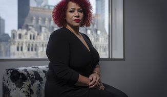Journalist Nikole Hannah-Jones poses for a portrait at the headquarters of The Associated Press in New York, on Friday, Dec. 10, 2021. The University of North Carolina at Chapel Hill announced Friday, July 15, 2022, that it has reached a settlement with Hannah-Jones, the journalist who ultimately shunned the school in an extended dispute over tenure and joined a historically Black university. (AP Photo/Robert Bumsted, File)