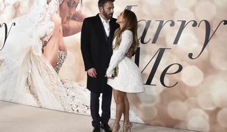 Cast member Jennifer Lopez, right, and Ben Affleck attend a photo call for a special screening of &amp;quot;Marry Me&amp;quot; at DGA Theater on Feb. 8, 2022, in Los Angeles. The couple have obtained a marriage license in Nevada, according to court records posted Sunday, July 17, 2022. (Photo by Jordan Strauss/Invision/AP, File)