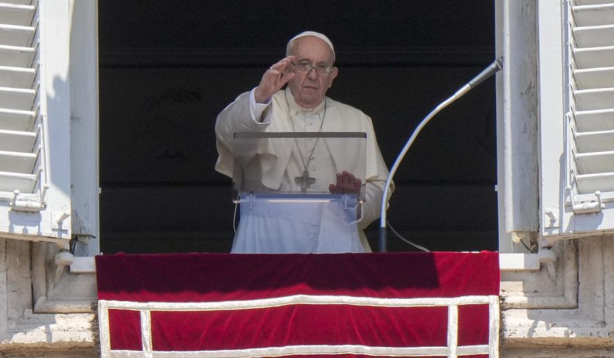 Pope Francis delivers his blessing as he recites the Angelus noon prayer from the window of his studio overlooking St.Peter&#39;s Square, at the Vatican, Sunday, July 17, 2022. (AP Photo/Andrew Medichini)