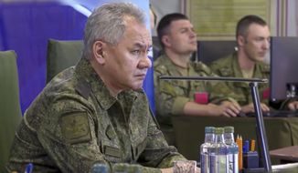 This handout photo taken from video released by the Russian Defense Ministry Press Service on Monday, July 18, 2022, shows Russian Defense Minister Sergei Shoigu, listening during a meeting during inspection of the Vostok battlegroup at an undisclosed location. (Russian Defense Ministry Press Service photo via AP)
