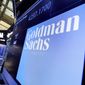 The logo for Goldman Sachs appears above a trading post on the floor of the New York Stock Exchange on Dec. 13, 2016. (AP Photo/Richard Drew) **FILE**