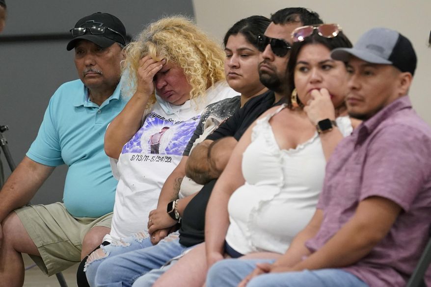 Family of shooting victims listen to the Texas House investigative committee release its full report on the shootings at Robb Elementary School, Sunday, July 17, 2022, in Uvalde, Texas. (AP Photo/Eric Gay)