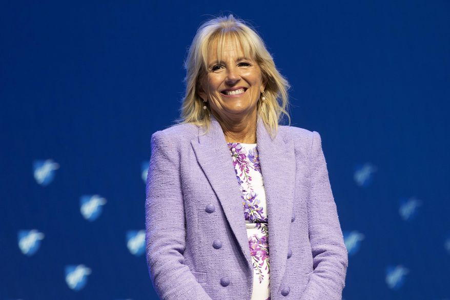 First Lady Jill Biden smiles as she is introduced before speaking during the American Federation of Teachers convention, Friday, July 15, 2022, in Boston. (AP Photo/Michael Dwyer)