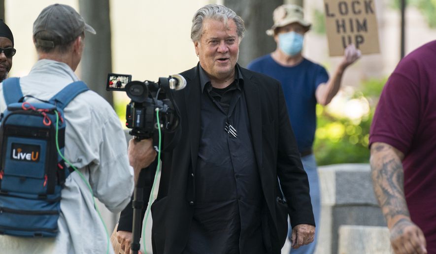 Former White House strategist Steve Bannon arrives at federal court in Washington, Wednesday, July 20, 2022. Bannon was brought to trial on a pair of federal charges for criminal contempt of Congress after refusing to cooperate with the House committee investigating the U.S. Capitol insurrection on Jan. 6, 2021. (AP Photo/Manuel Balce Ceneta)