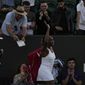 Venus Williams of the U.S. and Britain&#39;s Jamie Murray leave the court after being defeated in a second round mixed doubles match against Britain&#39;s Jonny O&#39;Mara and Alicia Barnett on day seven of the Wimbledon tennis championships in London, Sunday July 3, 2022. (AP Photo/Alastair Grant) **FILE**