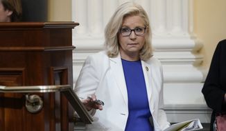 Vice Chair Liz Cheney, R-Wyo., arrives after a break as the House select committee investigating the Jan. 6 attack on the U.S. Capitol holds a hearing at the Capitol in Washington, Thursday, July 21, 2022. (AP Photo/J. Scott Applewhite)