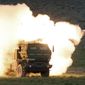 A launch truck fires the High Mobility Artillery Rocket System (HIMARS) produced by Lockheed Martin during combat training in the high desert of the Yakima Training Center, Washington in May 23, 2011. The HIMARS systems supplied by the U.S. and similar M270 provided by Britain have significantly bolstered the Ukrainian army&#39;s precision strike capability. The deliveries of Western arms have been crucial for Ukraine’s efforts to fend off Russian attacks in the nearly 5-month-old war. (Tony Overman/The Olympian via AP, File)