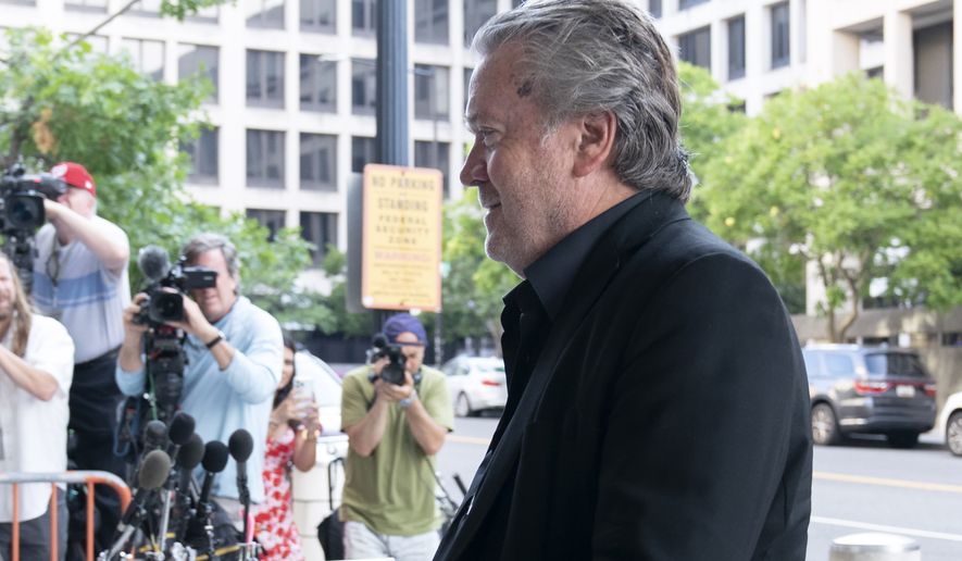 Former White House strategist Steve Bannon arrives at the federal court in Washington, Friday, July 22, 2022. Bannon was brought to trial on a pair of federal charges for criminal contempt of Congress after refusing to cooperate with the House committee investigating the U.S. Capitol insurrection on Jan. 6, 2021. (AP Photo/Jose Luis Magana)