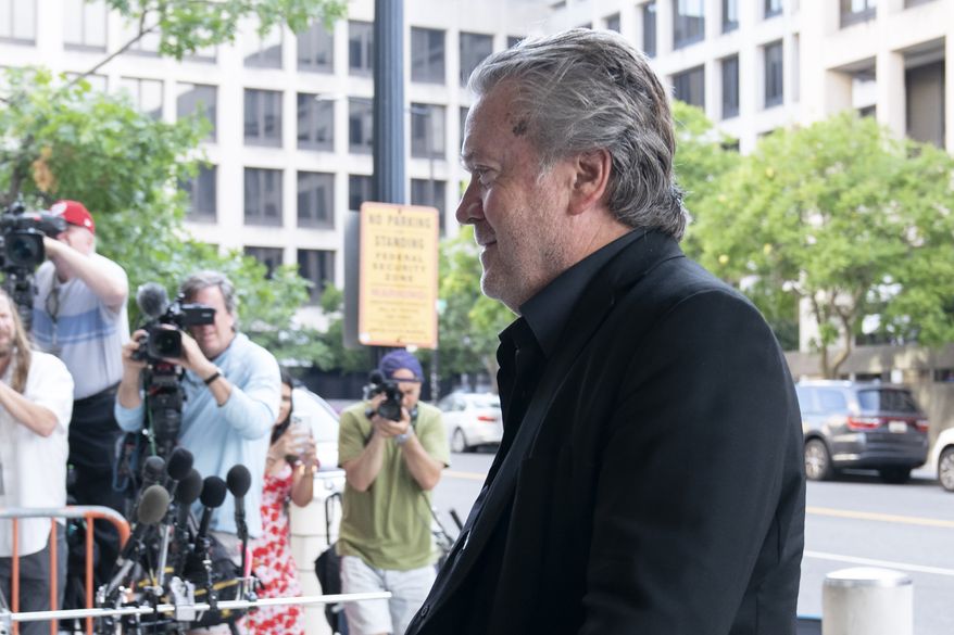 Former White House strategist Steve Bannon arrives at the federal court in Washington, Friday, July 22, 2022. Bannon was brought to trial on a pair of federal charges for criminal contempt of Congress after refusing to cooperate with the House committee investigating the U.S. Capitol insurrection on Jan. 6, 2021. (AP Photo/Jose Luis Magana)