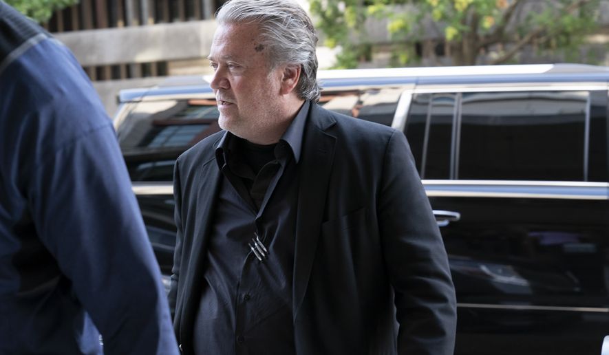 Former White House strategist Steve Bannon arrives at the federal court in Washington, Friday, July 22, 2022. Bannon was brought to trial on a pair of federal charges for criminal contempt of Congress after refusing to cooperate with the House committee investigating the U.S. Capitol insurrection on Jan. 6, 2021. (AP Photo/Jose Luis Magana)
