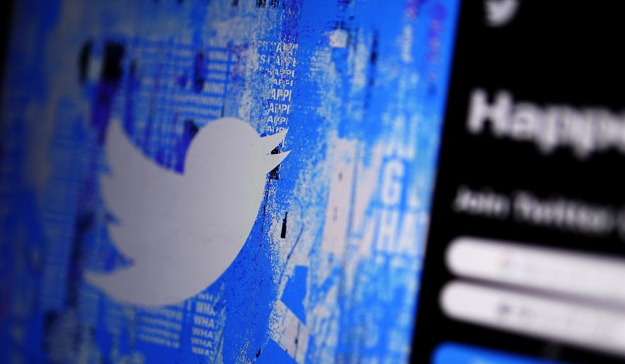 The Twitter splash page is seen on a digital device, Monday, April 25, 2022, in San Diego. Twitter reported a quarterly loss Friday, July 22,  as revenue slipped even as user numbers climbed.  (AP Photo/Gregory Bull)