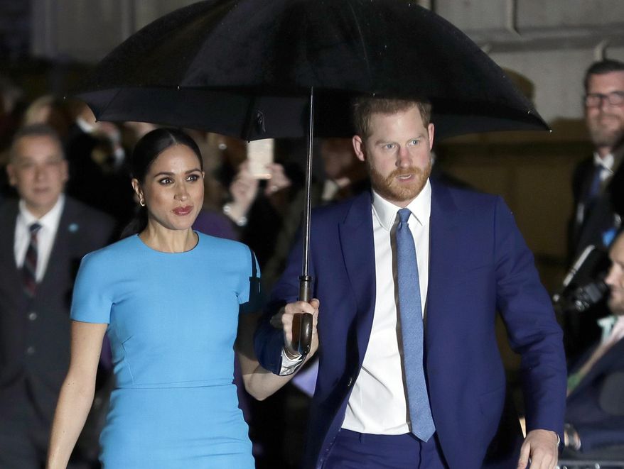 Britain&#39;s Prince Harry and Meghan, the Duke and Duchess of Sussex, arrive at the annual Endeavour Fund Awards in London, Thursday, March 5, 2020. Prince Harry can take the British government to court over his security arrangements when he visits the U.K., a judge ruled Friday, July 22, 2022. Harry and his wife Meghan lost publicly funded police protection in the U.K. when they stepped down as senior working royals and moved to North America in 2020. (AP Photo/Kirsty Wigglesworth, File)