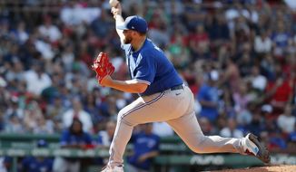 Toronto Blue Jays&#39; Alek Manoah pitches against the Boston Red Sox during the first inning of a baseball game, Saturday, July 23, 2022, in Boston. (AP Photo/Michael Dwyer)