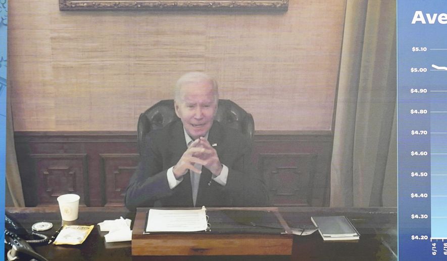 President Joe Biden speaks virtually during a meeting with his economic team in the South Court Auditorium on the White House complex in Washington, Friday, July 22, 2022. Biden&#x27;s condition continues to improve since testing positive for the coronavirus, and he likely contracted a highly contagious variant that has been spreading rapidly through the United States, according to an update from his doctor on Saturday, July 23. (AP Photo/Andrew Harnik, File)