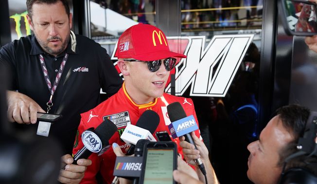 NASCAR driver Ty Gibbs talks to reporters before an auto race at Pocono Raceway, Sunday, July 24, 2022 in Long Pond, Pa. (AP Photo/Matt Slocum)