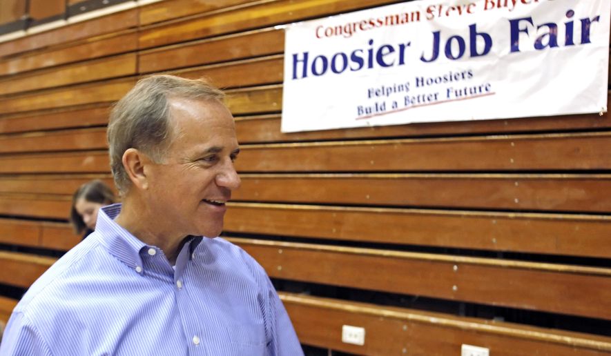 Indiana Congressman Stephen Buyer talks during a Hoosier Job Fair, July 19, 2010, at Jefferson High School in Lafayette, Ind. The former U.S. congressman from Indiana, technology company executives and an investment banker are among nine people charged in four separate and unrelated insider trading schemes. The charges were announced Monday, July 25, 2022 in Manhattan. (Michael Heinz/Journal & Courier via AP)