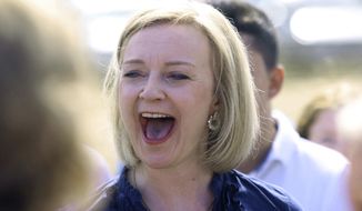 Britain&#39;s Foreign Secretary Liz Truss reacts as she speaks to supporters during a visit to Ashley House, as part of her campaign to be leader of the Conservative and Unionist Party and the next prime minister, in Kent, England, Saturday July 23, 2022. (James Manning/PA via AP)