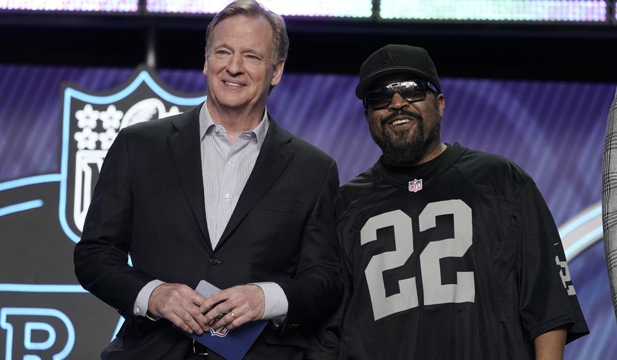 Rapper Ice Cube, right, poses with NFL Commissioner Roger Goodell during the first round of the NFL football draft Thursday, April 28, 2022, in Las Vegas. The NFL is teaming up with Ice Cube. The league announced Thursday, June 30, 2022, a partnership with Contract with Black America Institute, an economic inclusion-focused initiative led by artist and entrepreneur O&#39;Shea Jackson, who is known as Ice Cube.(AP Photo/John Locher, File)