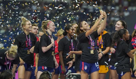 United States&#39; Alex Morgan takes a selfie as she celebrates after winning the CONCACAF Women&#39;s Championship final soccer match against Canada in Monterrey, Mexico, Monday, July 18, 2022. (AP Photo/Fernando Llano) **FILE**