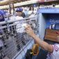 Washington Nationals&#x27; Juan Soto signs autographs for fans prior to a baseball game against the Los Angeles Dodgers Tuesday, July 26, 2022, in Los Angeles. (AP Photo/Mark J. Terrill)