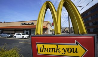 A sign is shown in front of a McDonald&#39;s restaurant in Pittsburgh on Saturday, April 23, 2022. (AP Photo/Gene J. Puskar) ** FILE **