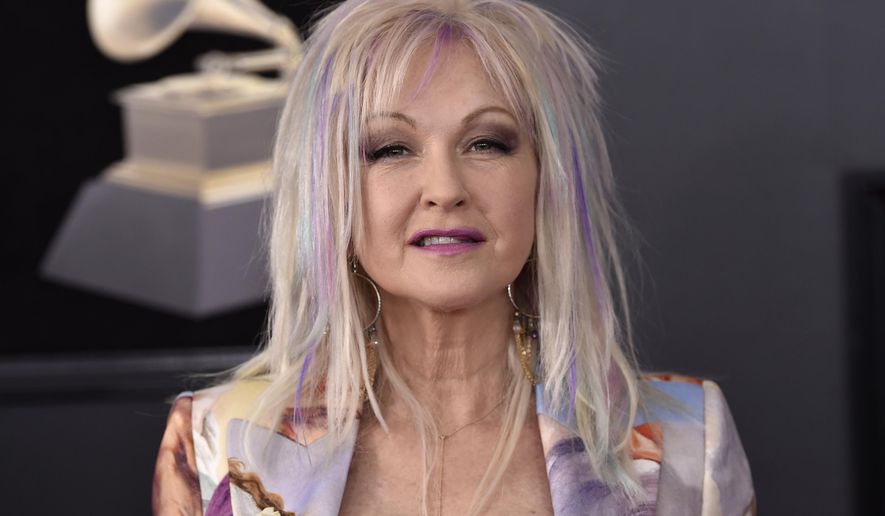 Cyndi Lauper arrives at the 60th annual Grammy Awards at Madison Square Garden in New York, Sunday, Jan. 28, 2018. Three years after it closed on Broadway, the Lauper- and Harvey Fierstein-created musical “Kinky Boots” returns to New York City. (Photo by Evan Agostini/Invision/AP, File)
