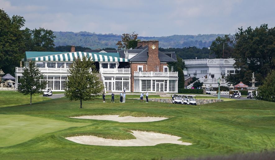 Golfers gather at Trump National Golf Club in Bedminster, N.J., on Oct. 2, 2020. A group of Sept. 11, 2001, victims&#x27; family members are condemning former President Donald Trump for hosting the Saudi-backed LIV golf tour at his New Jersey course later this month. (AP Photo/Seth Wenig, File)