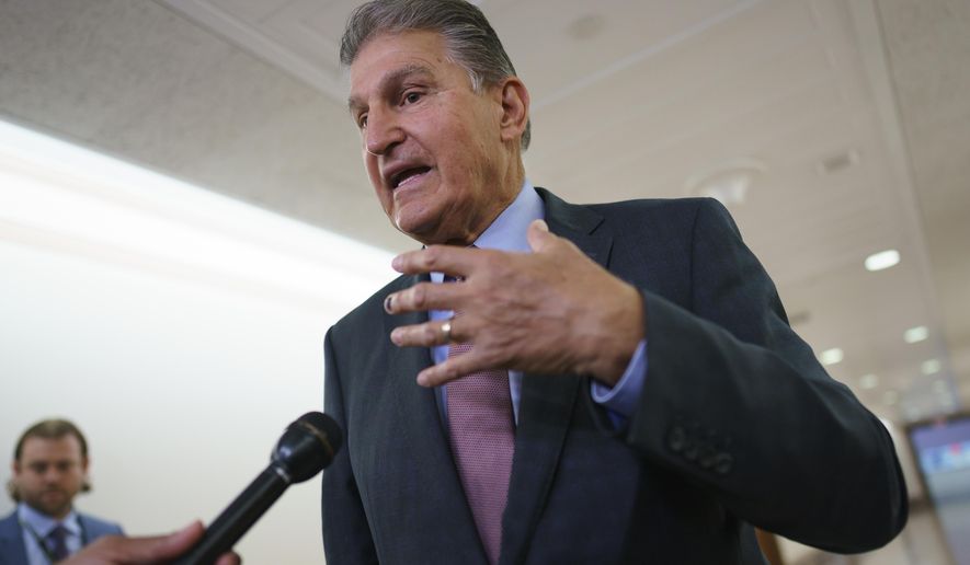 Sen. Joe Manchin, D-W.Va., speaks to reporters outside the hearing room where he chairs the Senate Committee on Energy and Natural Resources, at the Capitol in Washington, July 19, 2022. Manchin announced Wednesday, July 27, that he had reached an expansive agreement with Senate Majority Leader Chuck Schumer which had eluded them for months on health care costs, energy and climate issues, taxing higher earners and large corporations and reducing federal debt. (AP Photo/J. Scott Applewhite, File)