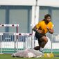 Washington Commanders defensive end Chase Young works during practice at the team&#x27;s NFL football training facility, Thursday, July 28, 2022 in Ashburn, Va. (AP Photo/Alex Brandon)