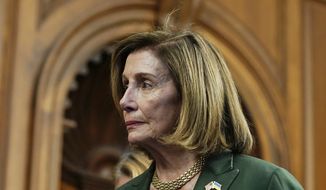 House Speaker Nancy Pelosi of Calif., listens during a press conference on protecting women&#39;s reproductive health care, Thursday, July 28, 2022, on Capitol Hill in Washington. (AP Photo/Mariam Zuhaib)