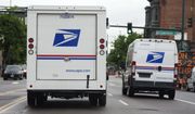 In this file photo, a USPS logo adorns the back doors of United States Postal Service delivery vehicles as they proceed westbound along 20th Street from Stout Street and the main post office in downtown Denver, Wednesday, June 1, 2022. AP Photo/David Zalubowski, File)  **FILE**