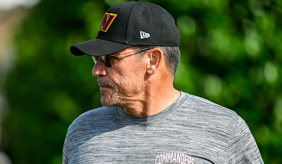 Washington Commanders head coach Ron Rivera heads to the practice field on the second day of training camp at The Park, Ashburn, VA, July 28, 2022. (Photo by Brian Murphy)