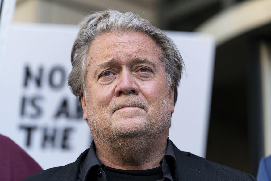Former White House strategist Steve Bannon, pauses as he departs federal court on Friday, July 22, 2022, in Washington. Bannon, a longtime ally of former President Donald Trump has been convicted of contempt charges for defying a congressional subpoena from the House committee investigating the Jan. 6 insurrection at the U.S. Capitol. (AP Photo/Alex Brandon)