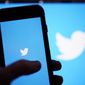 The Twitter application is seen on a digital device, April 25, 2022, in San Diego. Twitter warned Thursday, July 28, that governments around the globe are asking the company to remove content or snoop on private details of user accounts at an alarming rate. (AP Photo/Gregory Bull, File)