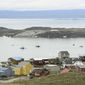 FILE - Small boats make their way through the Frobisher Bay inlet in Iqaluit, Nunavut, Canada on Friday, Aug. 2, 2019.  In his extensive papal travels, Pope Francis has never journeyed further north than Iqaluit, the capital city of the Inuit-governed territory of Nunavut in northern Canada. On Friday, July 28, 2022, it will be the third and final stop of the pope&#39;s six-day Canadian visit, focused on apologies for abuses of Indigenous youths at Catholic-run boarding schools.(Sean Kilpatrick/The Canadian Press via AP, File)