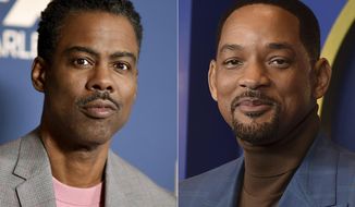 In this combo of file photos, Chris Rock, left, appears at the FX portion of the Television Critics Association Winter press tour in Pasadena, Calif., on Jan. 9, 2020; and Will Smith appears at the 94th Academy Awards nominees luncheon in Los Angeles on March 7, 2022. Smith has again apologized to Chris Rock for slapping him during the Oscar telecast in a new video, saying that his behavior was “unacceptable” and revealing that he reached out to the comedian to discuss the incident but was told Rock wasn&#39;t ready. (AP Photo/File)