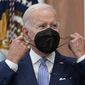 President Joe Biden removes his face mask as he arrives to speak about the economy during a meeting with CEOs in the South Court Auditorium on the White House complex in Washington, Thursday, July 28, 2022. Biden tested positive for COVID-19 again Saturday, July 30, slightly more than three days after he was cleared to exit coronavirus isolation, the White House said, in a rare case of “rebound” following treatment with an anti-viral drug. (AP Photo/Susan Walsh) **FILE**